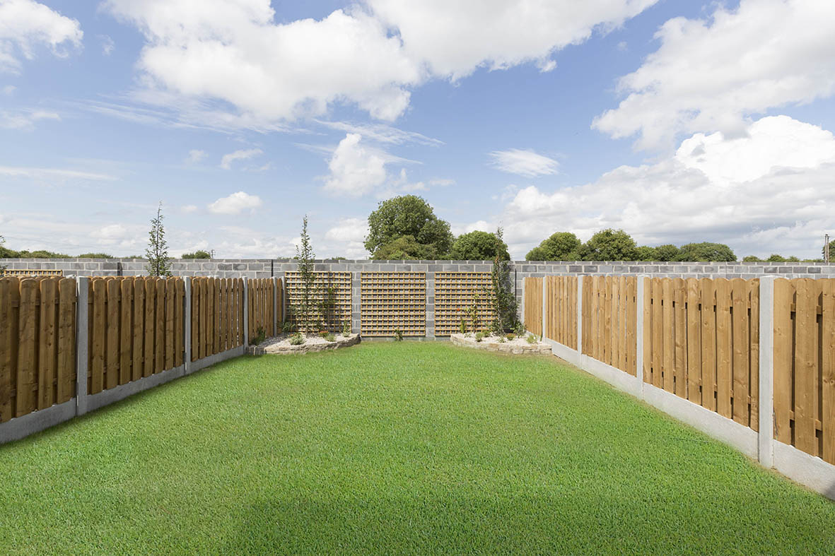 Rear garden leveled and seeded with concrete walls and concrete and plinth timber panel infill